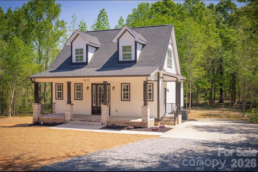 Front exterior of a new home in , Oakboro, NC, highlighting curb appeal (Image 24).