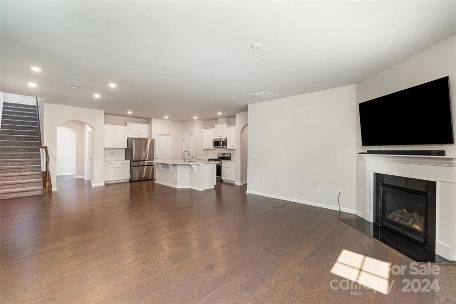 Living Room looking back at the kitchen and the open concept