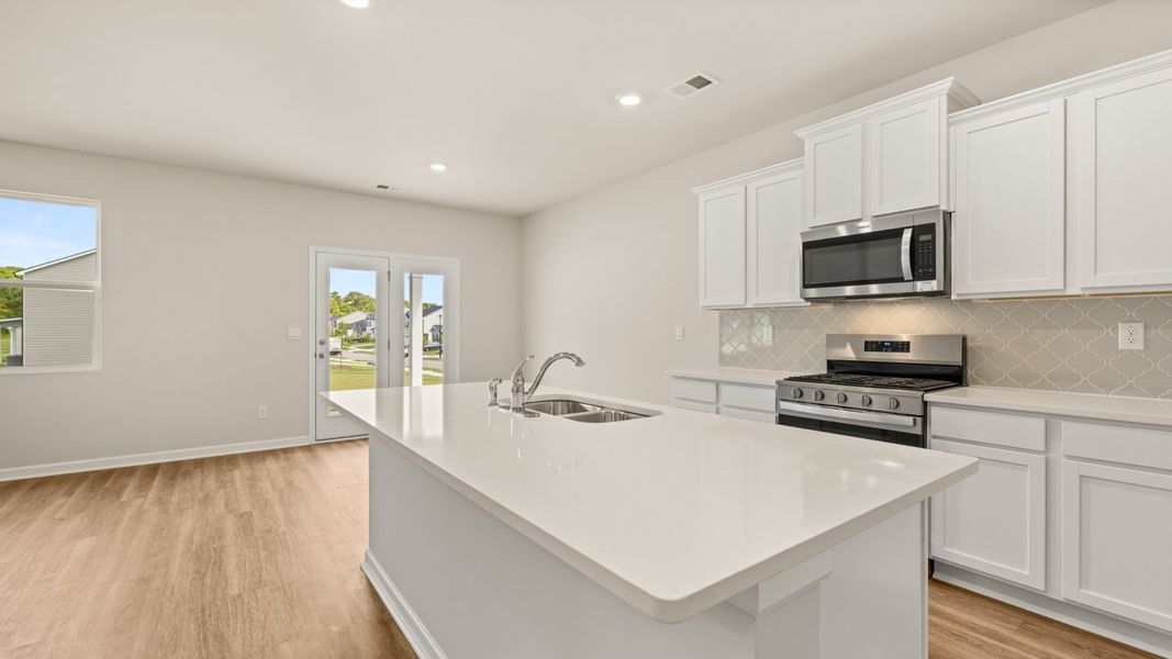Representative furnished interior of a home built from the Elle by D.R. Horton in Preserve at Dove Creek, Statham (Image 6).