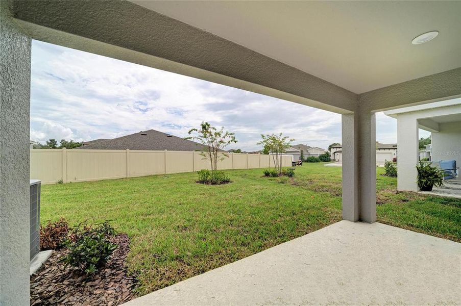 Exterior details and patio area of a home in Crosswind Point, Parrish (Image 3).
