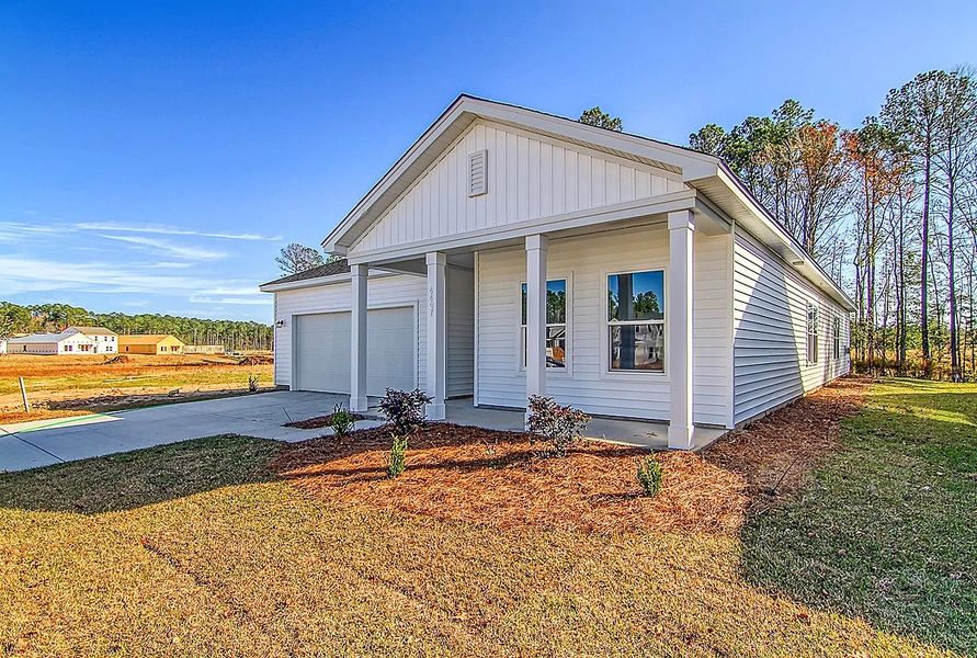 Representative exterior photo of a completed home built from the Truman by Ashton Woods in Watson Hill, Summerville, SC (Image 2).