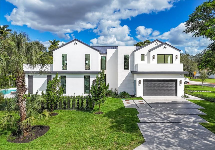 Front exterior of a new home in , South Miami, FL, highlighting curb appeal (Image 25).