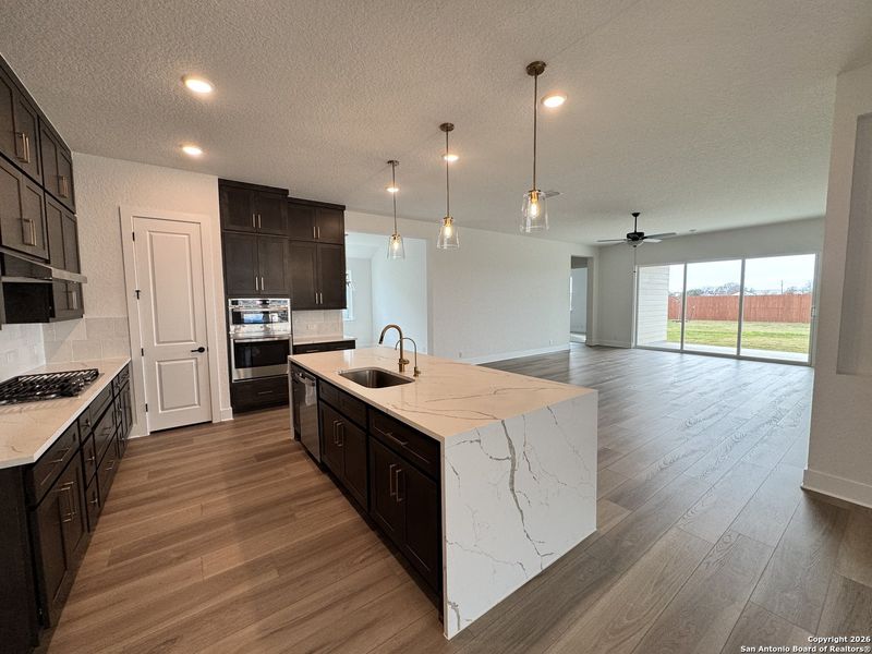 Furnished interior view inside a new home in Megan's Landing 70's, Castroville (Image 6).
