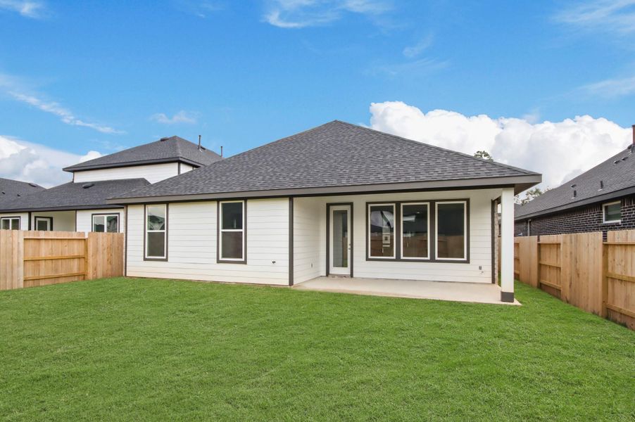 Exterior details and patio area of a home in Hills of Westlake, Conroe (Image 3). Exterior details and patio area of a home in Hills of Westlake, Conroe (Image 3).