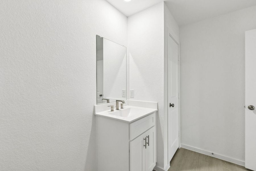 Furnished interior view inside a new home in Windcress, Baytown (Image 8).