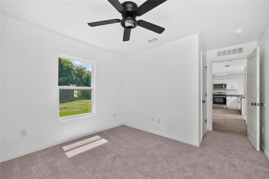 Spacious, unfurnished interior of a new home in , Port Charlotte (Image 50).