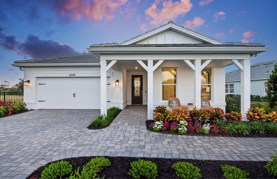 Representative exterior photo of a completed home built from the Palmary by Pulte Homes in Shores at Stillwater, Englewood, FL (Image 24).