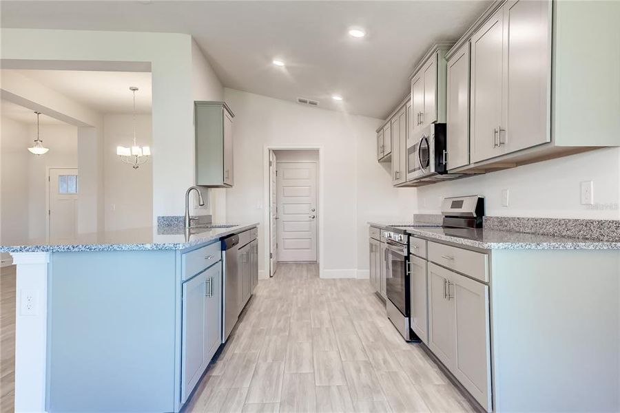 Furnished interior view inside a new home in Aviary at Rutland Ranch, Parrish (Image 7).