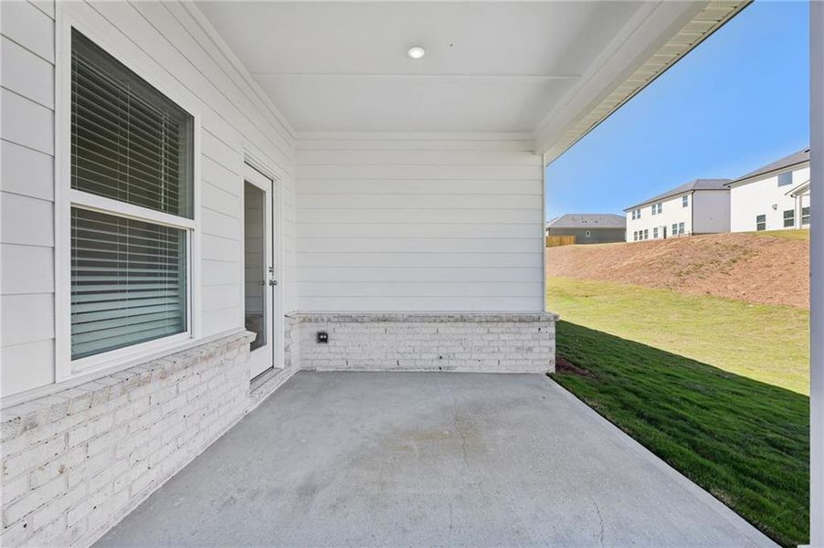 Exterior details and patio area of a home in Parkside at Grayson, Grayson (Image 3). Exterior details and patio area of a home in Parkside at Grayson, Grayson (Image 3).