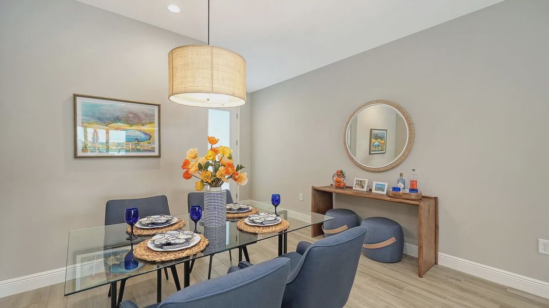 Representative furnished interior of a home built from the Avery by Neal Communities in SkySail, Naples (Image 19).