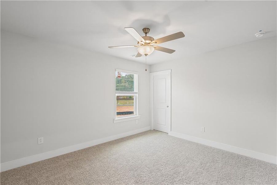 Spacious, unfurnished interior of a new home in Rose Creek, Cumming (Image 47).