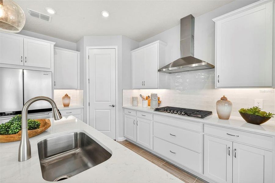 Furnished interior view inside a new home in Pasadena Ridge Master, Dade City (Image 15).