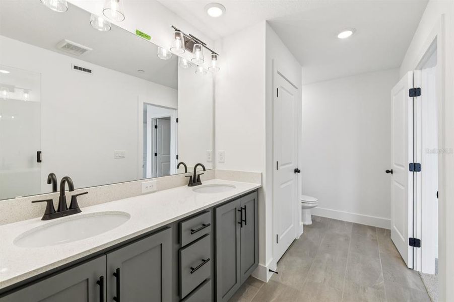 Furnished interior view inside a new home in Parkview at Hamlin, Winter Garden (Image 15). Furnished interior view inside a new home in Parkview at Hamlin, Winter Garden (Image 15).