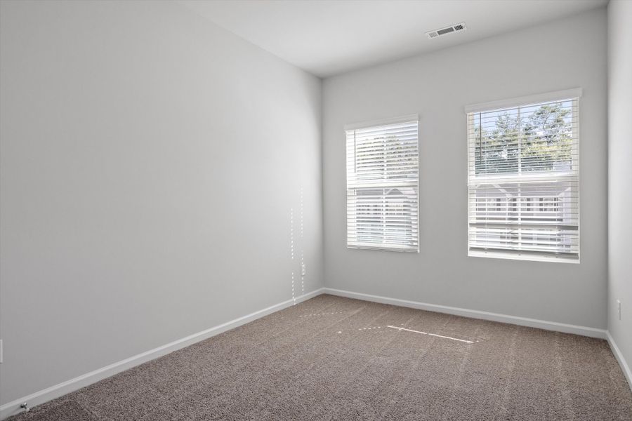 Spacious, unfurnished interior of a new home in West Main Townhomes, Sanford (Image 27).