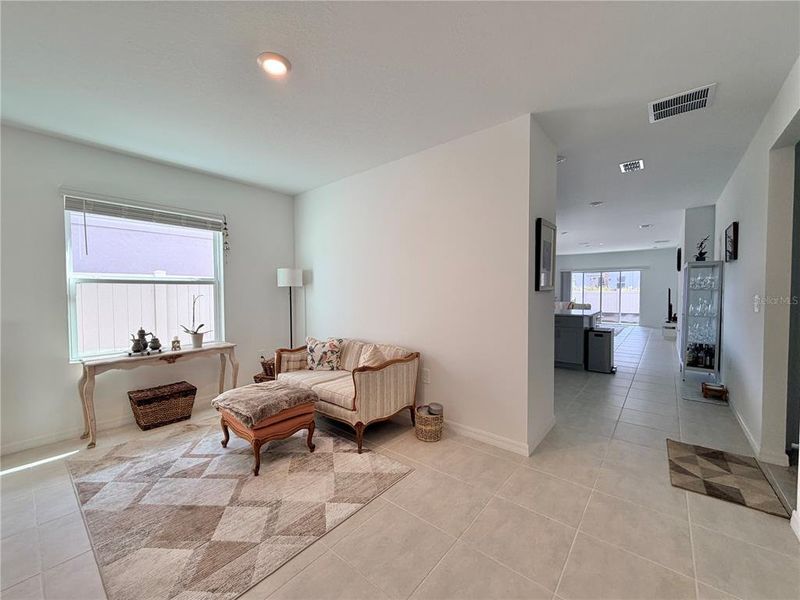 Furnished interior view inside a new home in Westview Community Group Page, Kissimmee (Image 8).