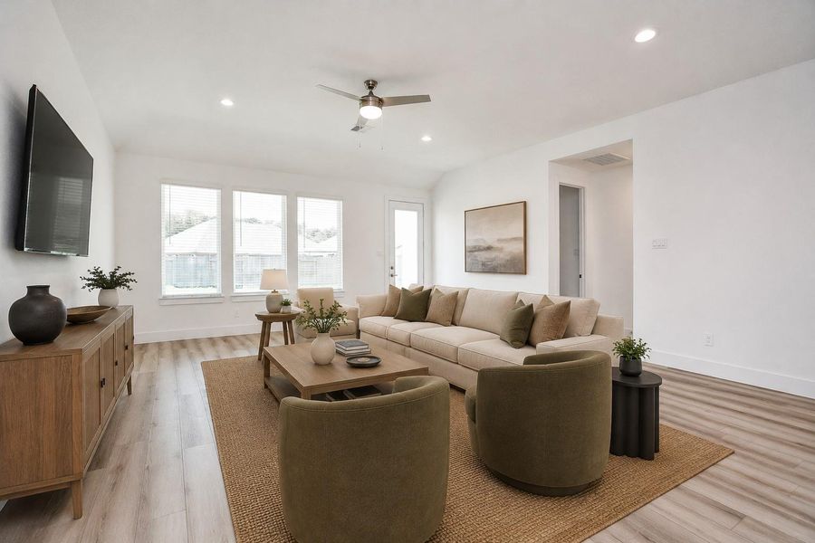 Expansive main living area with plenty of room to create distinct spaces for relaxing, entertaining and gathering, while a wall of windows brings in abundant natural light. *virtually staged*
