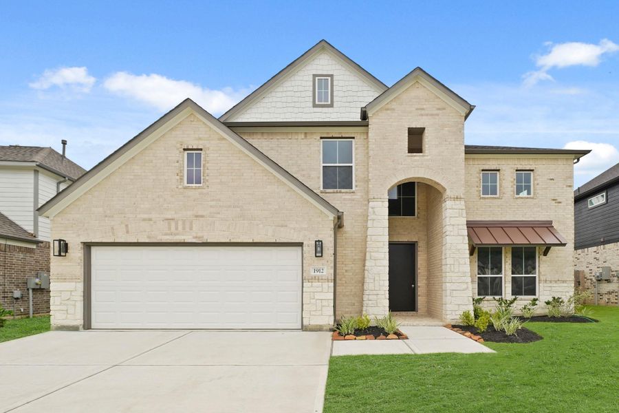 Front exterior of a new home in Barton Creek Ranch, Conroe, TX, highlighting curb appeal (Image 12). Front exterior of a new home in Barton Creek Ranch, Conroe, TX, highlighting curb appeal (Image 12).