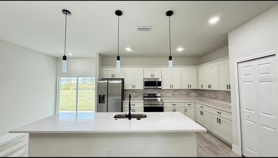 Furnished interior view inside a new home in , Ocala (Image 10).