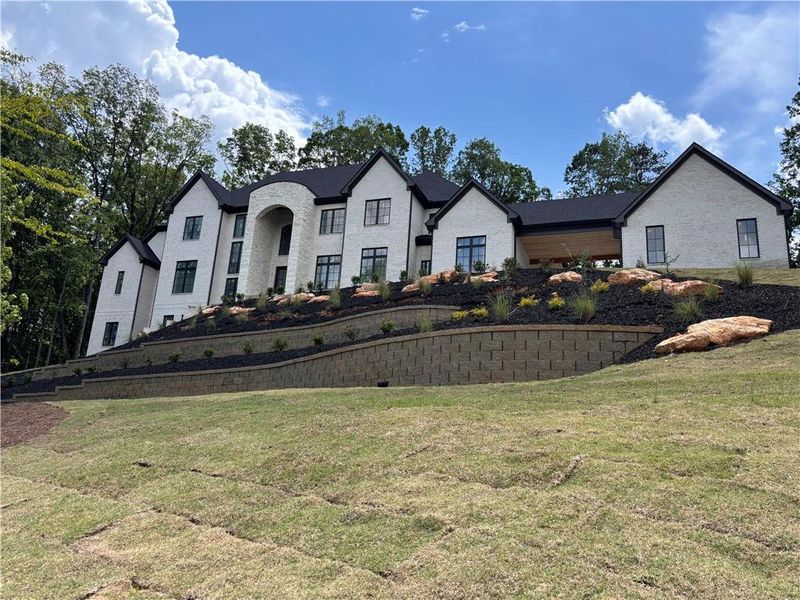 Front exterior of a new home in , Alpharetta, GA, highlighting curb appeal (Image 12).