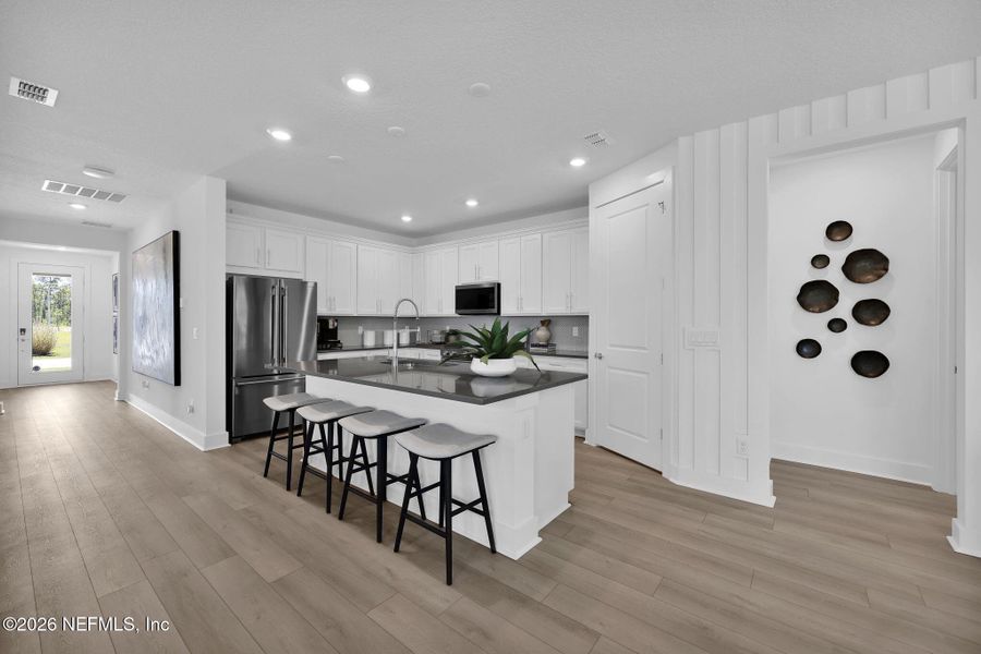 Furnished interior view inside a new home in Seminole Palms, Palm Coast (Image 7).