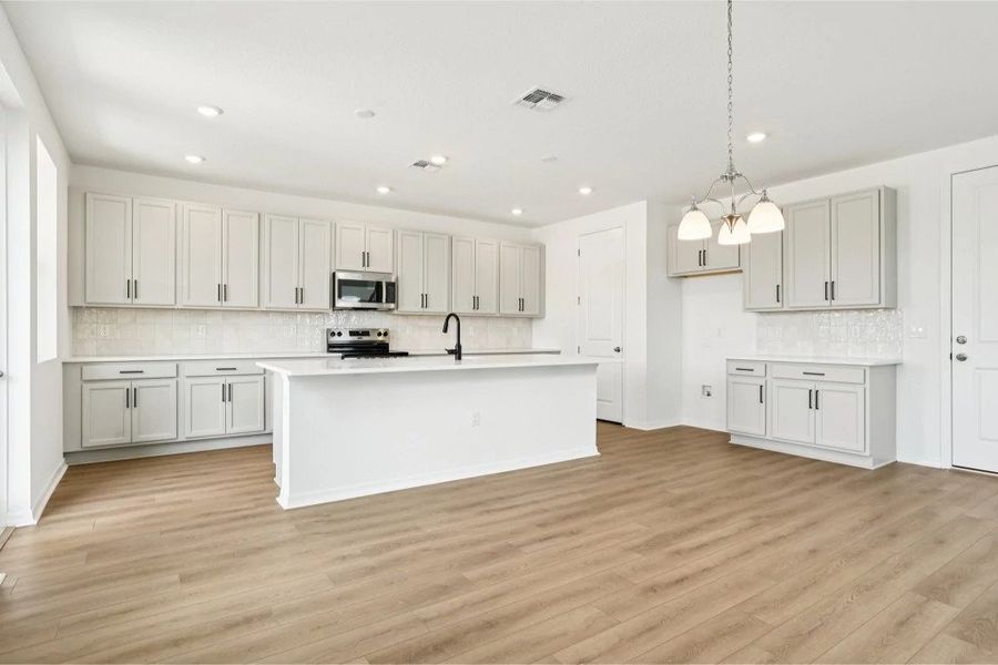 Furnished interior view inside a new home in Ardisia Park, New Smyrna Beach (Image 3).