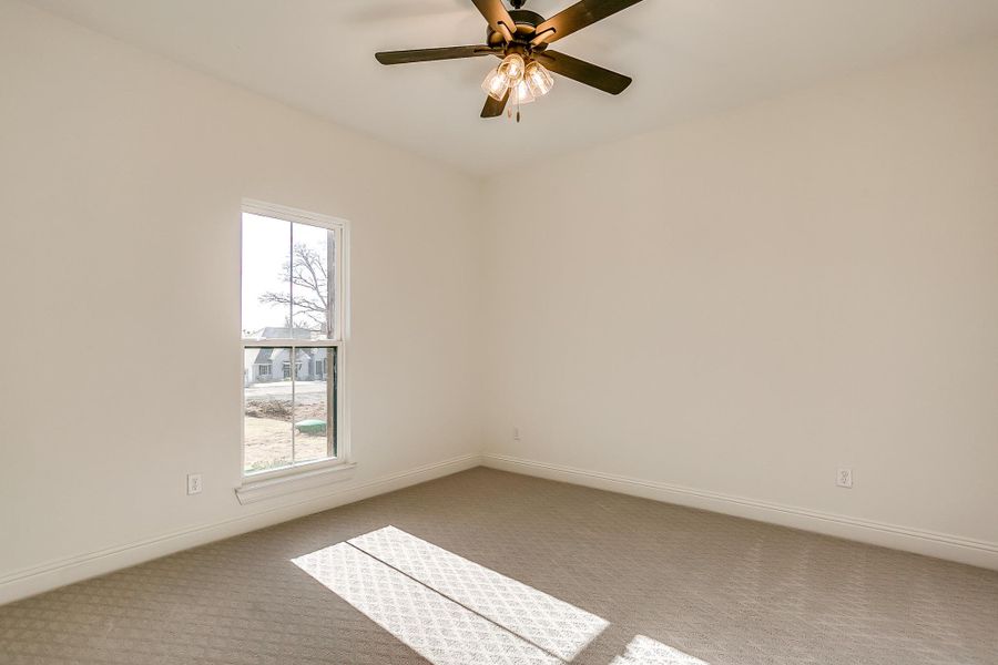 Representative unfurnished interior of a home built from the Cypress Court House by Trinity Classic Homes in Freeman Ranch, Weatherford (Image 35).