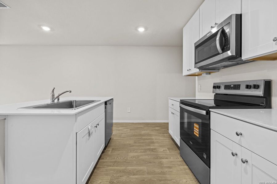 Furnished interior view inside a new home in Spring Valley, New Braunfels (Image 4). Furnished interior view inside a new home in Spring Valley, New Braunfels (Image 4).