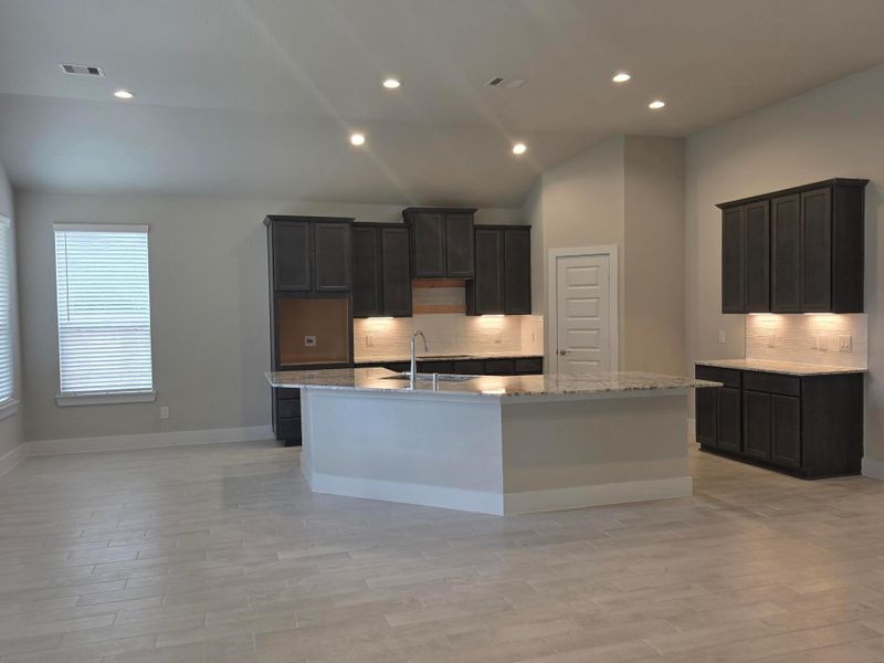 Furnished interior view inside a new home in Barton Creek Ranch, Conroe (Image 14).