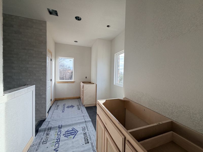 In-progress construction of a new home in Saddle Crest Estates, Weatherford, TX (Image 34).