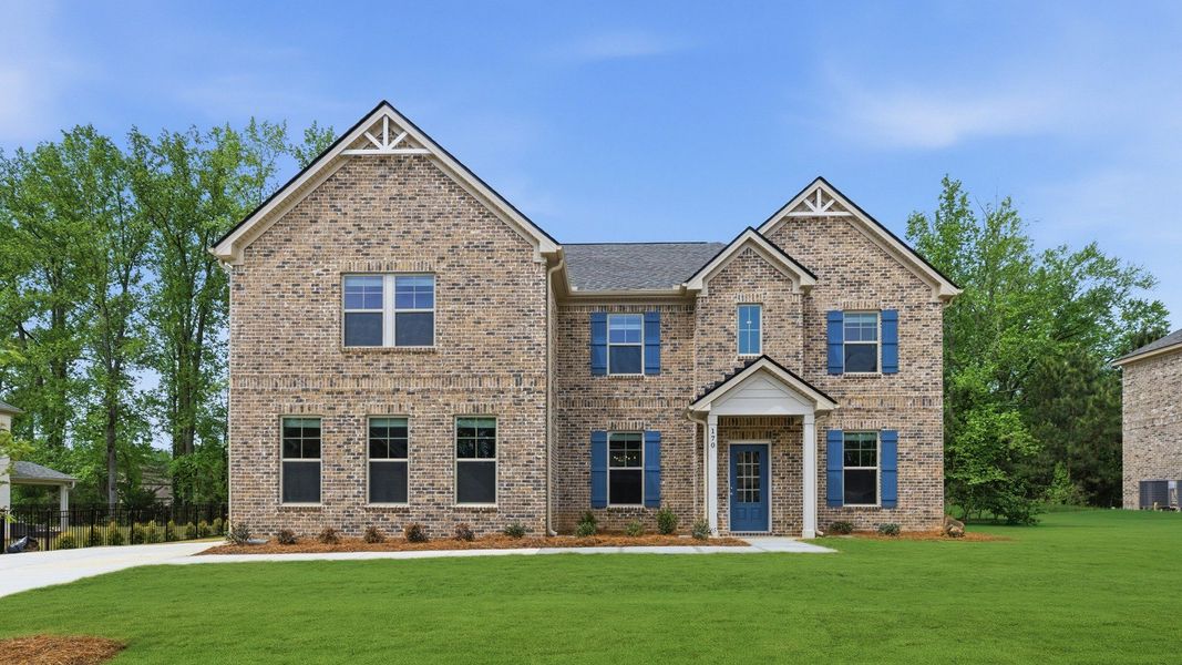 Representative exterior photo of a completed home built from the McKinley by DRB Homes in Cambria at Traditions, Hampton, GA (Image 22).