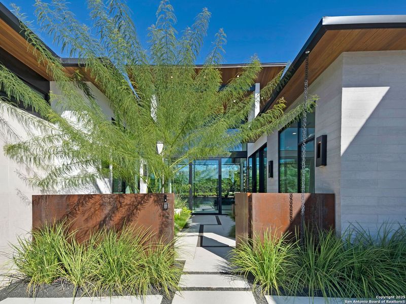 Exterior details and patio area of a home in , San Antonio (Image 33).
