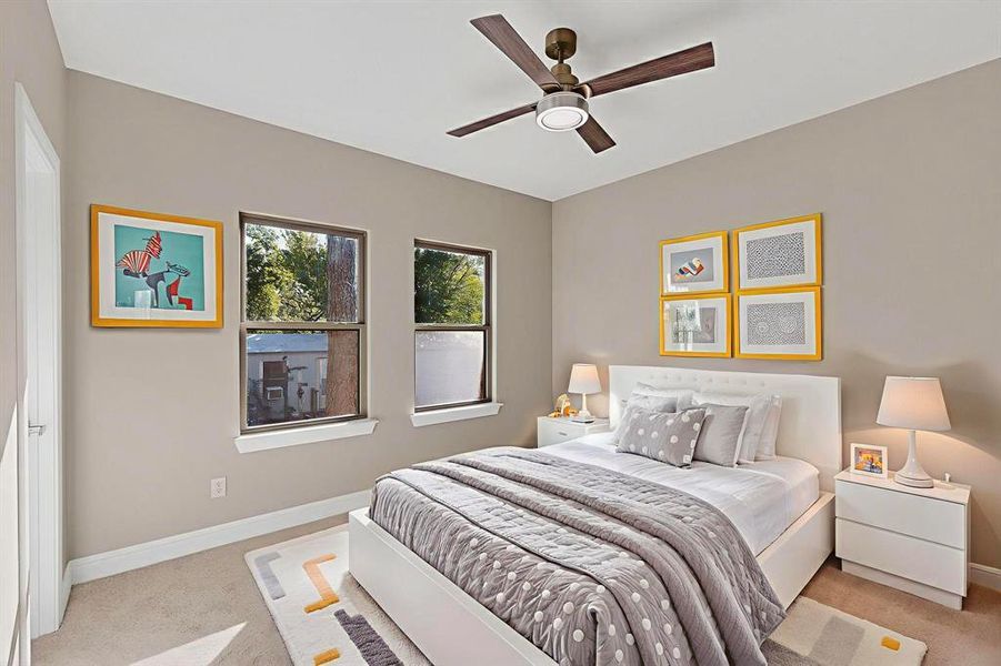 Bedroom featuring carpet flooring and ceiling fan