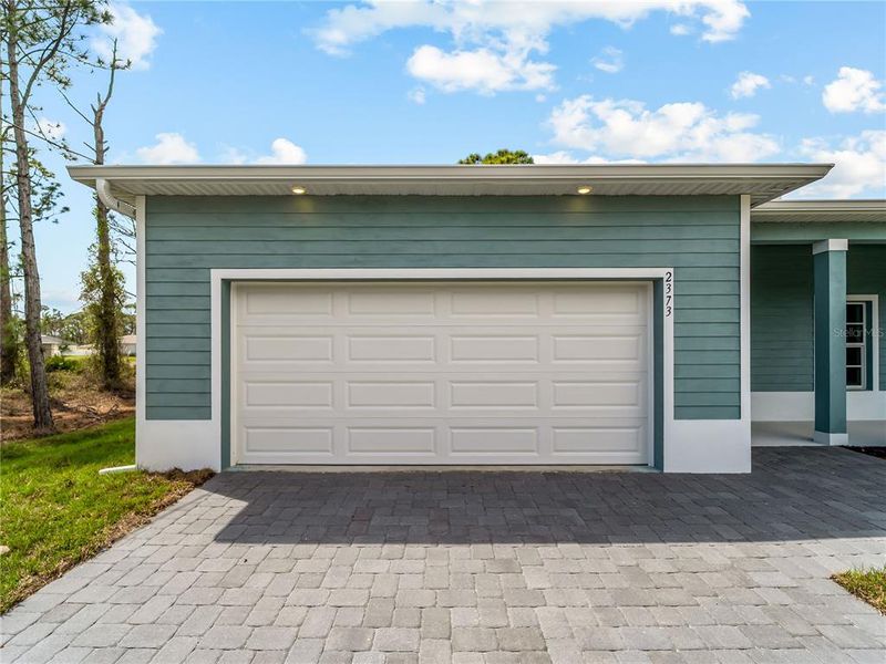 Exterior details and patio area of a home in , North Port (Image 32).