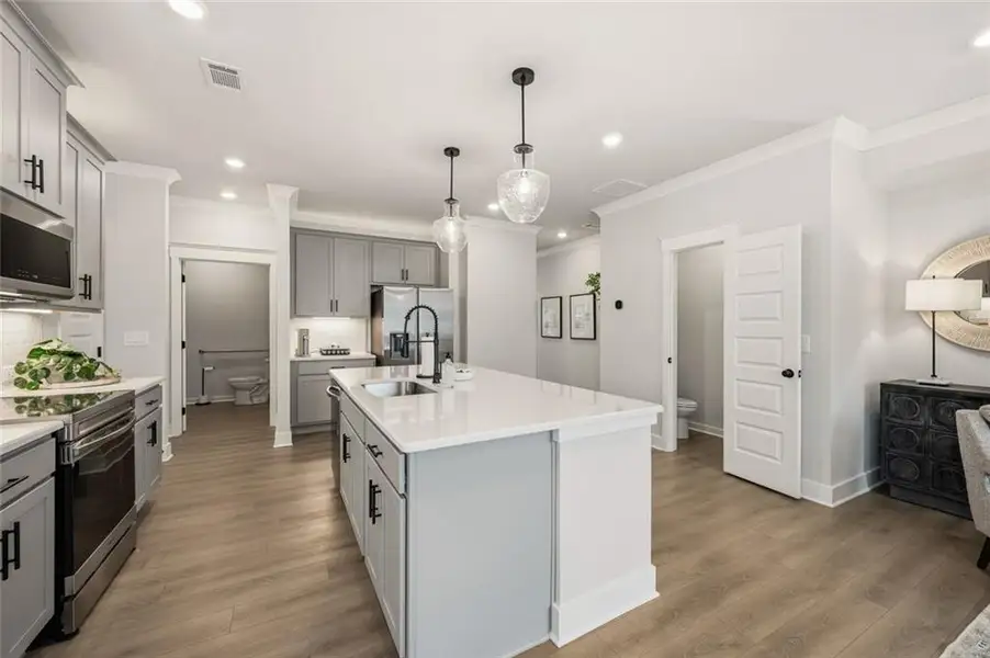 Furnished interior view inside a new home in Millstone at Mundy Mill, Gainesville (Image 6).