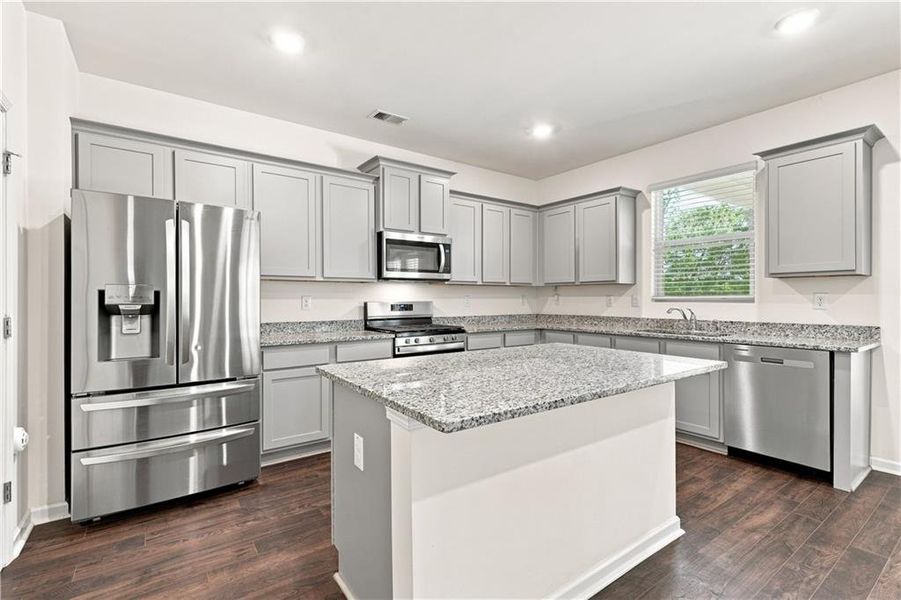 Furnished interior view inside a new home in The Enclave at Flat Rock Hills, Stonecrest (Image 14).
