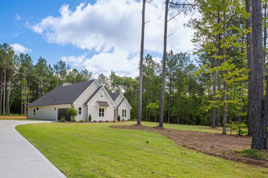 Front exterior of a new home in Flint Farms, Concord, GA, highlighting curb appeal (Image 26).