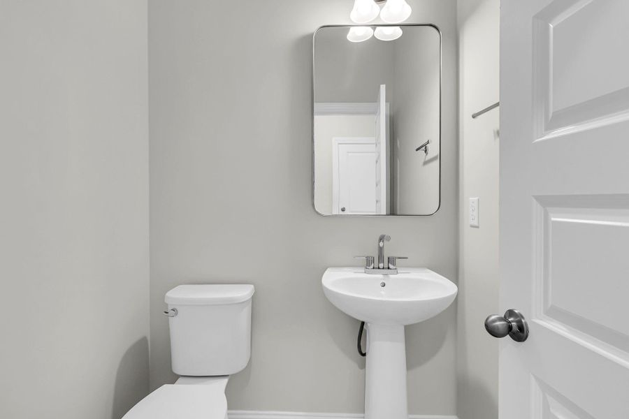 Furnished interior view inside a new home in Tidewater at Lakes of Cane Bay, Summerville (Image 7).