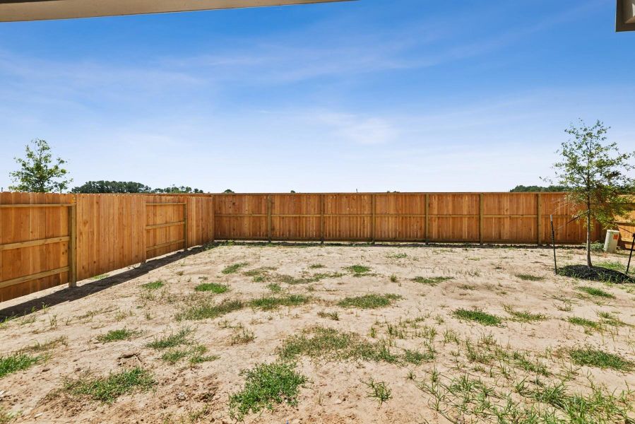 Exterior details and patio area of a home in Harvest Pointe, Needville (Image 4). Exterior details and patio area of a home in Harvest Pointe, Needville (Image 4).