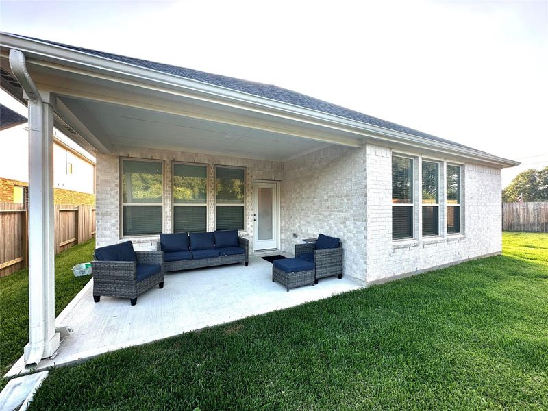 Exterior details and patio area of a home in , Tomball (Image 3).