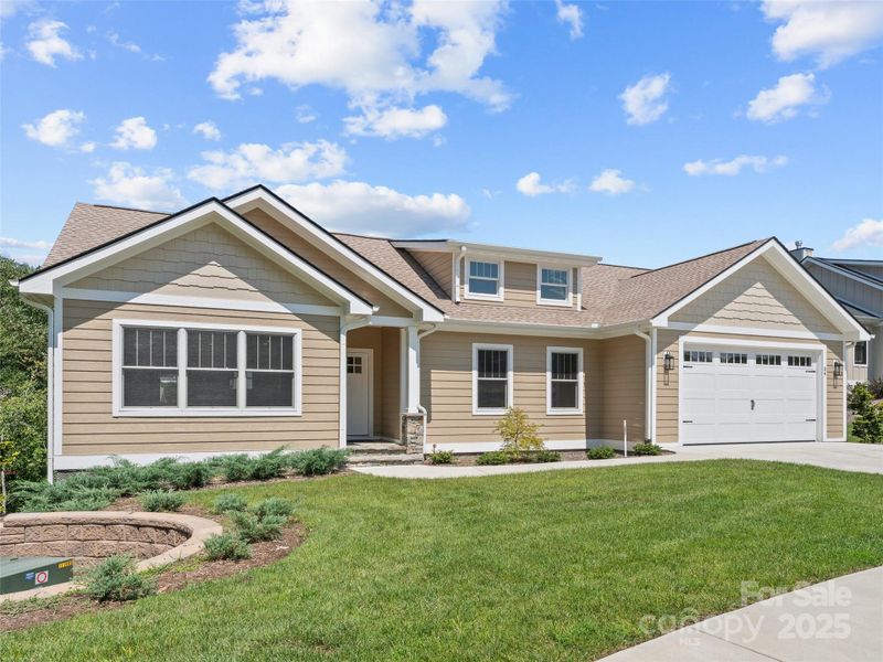 Front exterior of a new home in , Hendersonville, NC, highlighting curb appeal (Image 19). Front exterior of a new home in , Hendersonville, NC, highlighting curb appeal (Image 19).