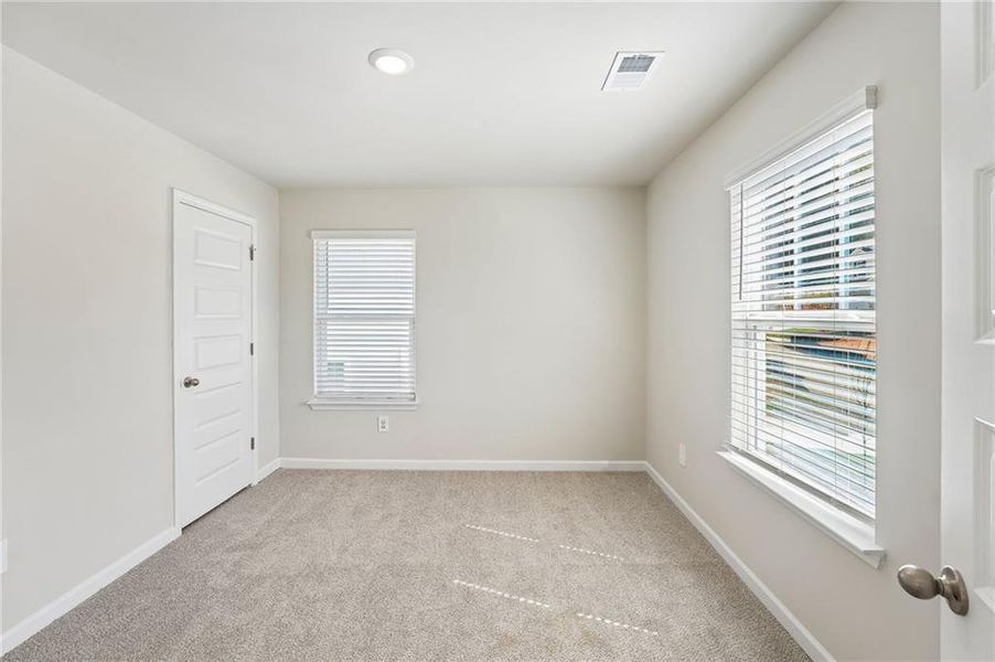 Spacious, unfurnished interior of a new home in Hemingway - Reserve Series, Cumming (Image 54).
