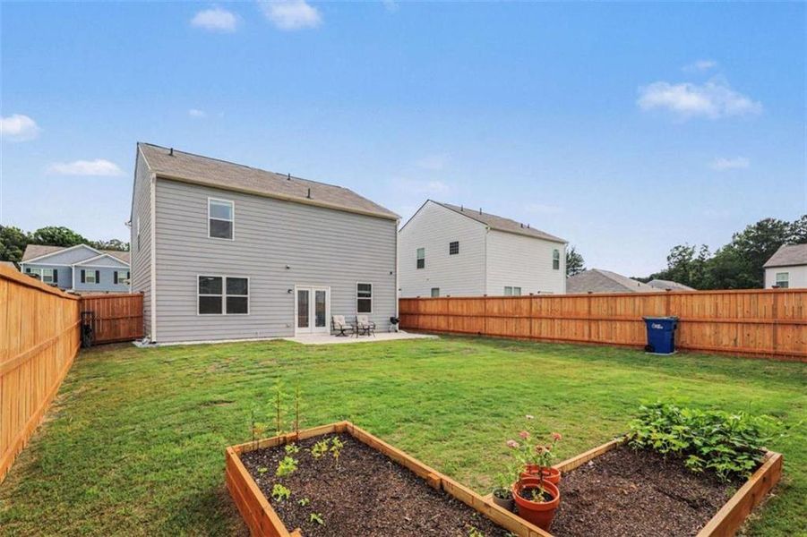 Exterior details and patio area of a home in , Fairburn (Image 29). Exterior details and patio area of a home in , Fairburn (Image 29).