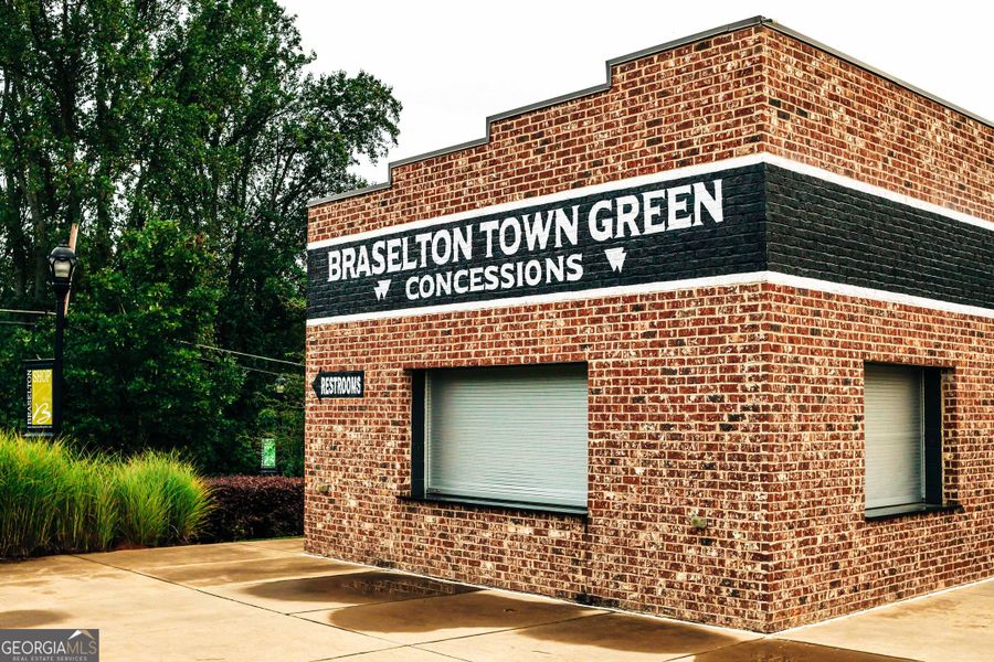 Front exterior of a new home in Rosewood Lake Estates, Hoschton, GA, highlighting curb appeal (Image 23).