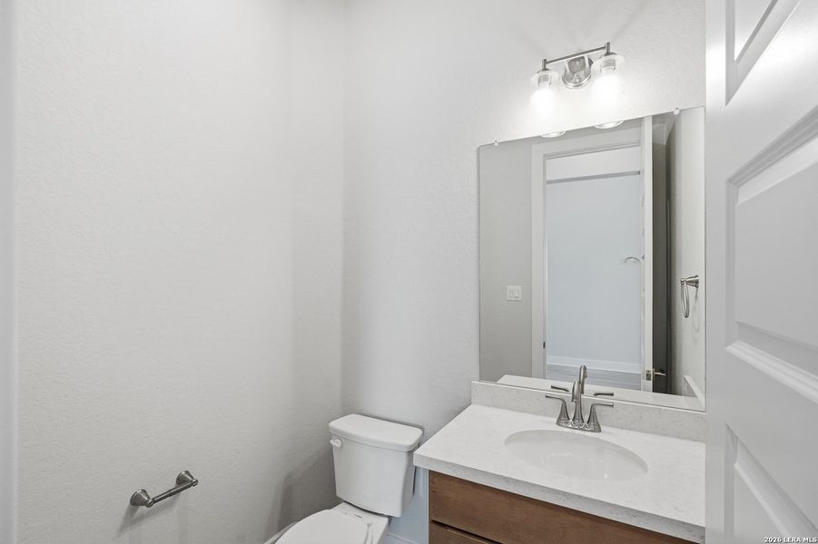 Furnished interior view inside a new home in Potranco Oaks, Castroville (Image 15).