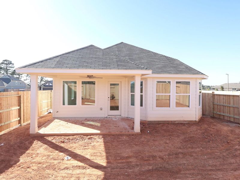 Exterior details and patio area of a home in Lone Star Landing, Montgomery (Image 3). Exterior details and patio area of a home in Lone Star Landing, Montgomery (Image 3).