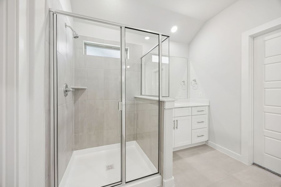 Primary bathroom in the Heisman home plan by Trophy Signature Homes – REPRESENTATIVE PHOTO Primary bathroom in the Heisman home plan by Trophy Signature Homes – REPRESENTATIVE PHOTO