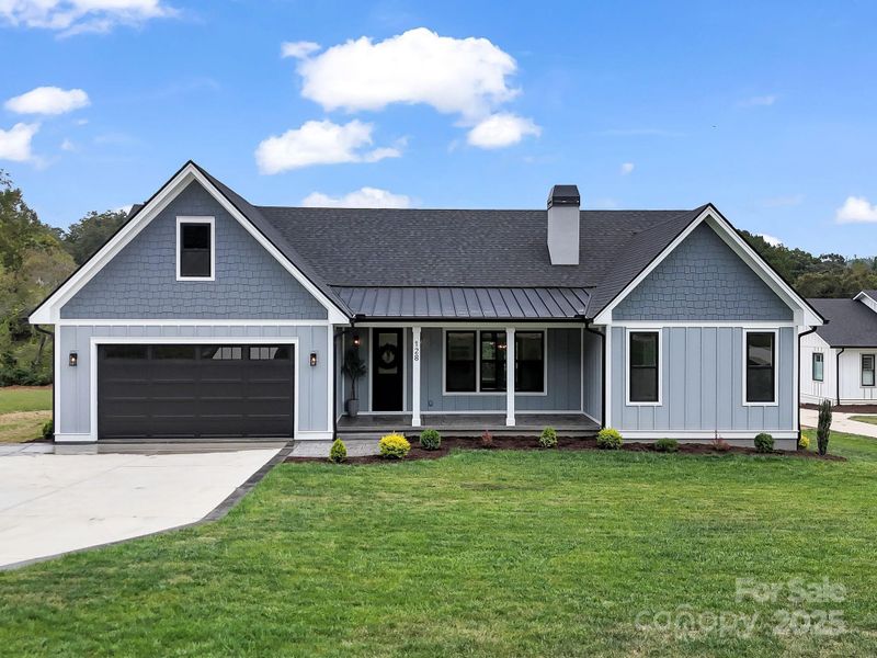 Front exterior of a new home in , Fletcher, NC, highlighting curb appeal (Image 2). Front exterior of a new home in , Fletcher, NC, highlighting curb appeal (Image 2).