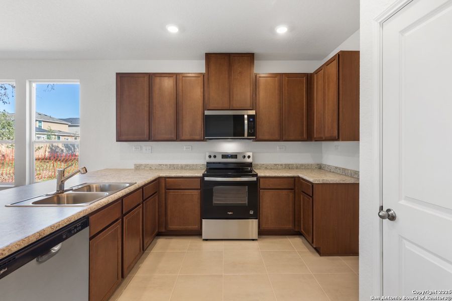 Furnished interior view inside a new home in Spanish Trails, San Antonio (Image 5).