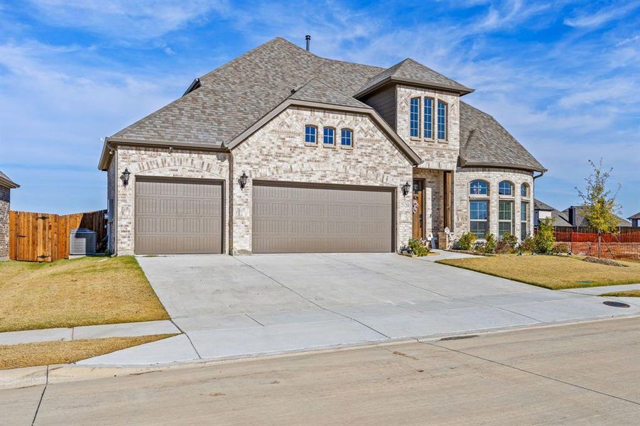 Front exterior of a new home in Stone River Glen, Royse City, TX, highlighting curb appeal (Image 24). Front exterior of a new home in Stone River Glen, Royse City, TX, highlighting curb appeal (Image 24).