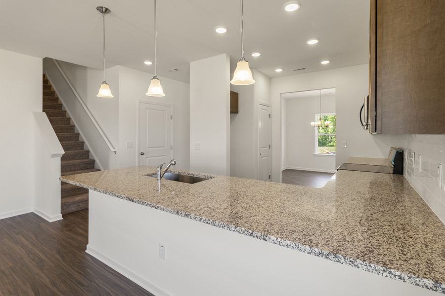 Furnished interior view inside a new home in The Exchange, Vass (Image 7).